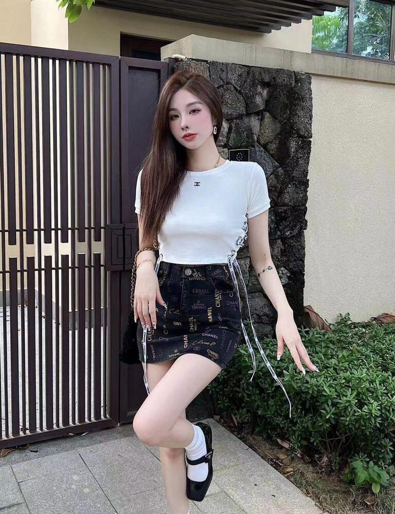 Chanel All-Over Logo Print Black Mini Skirt with Ribbon Ties — Women's Luxury Designer Skirt